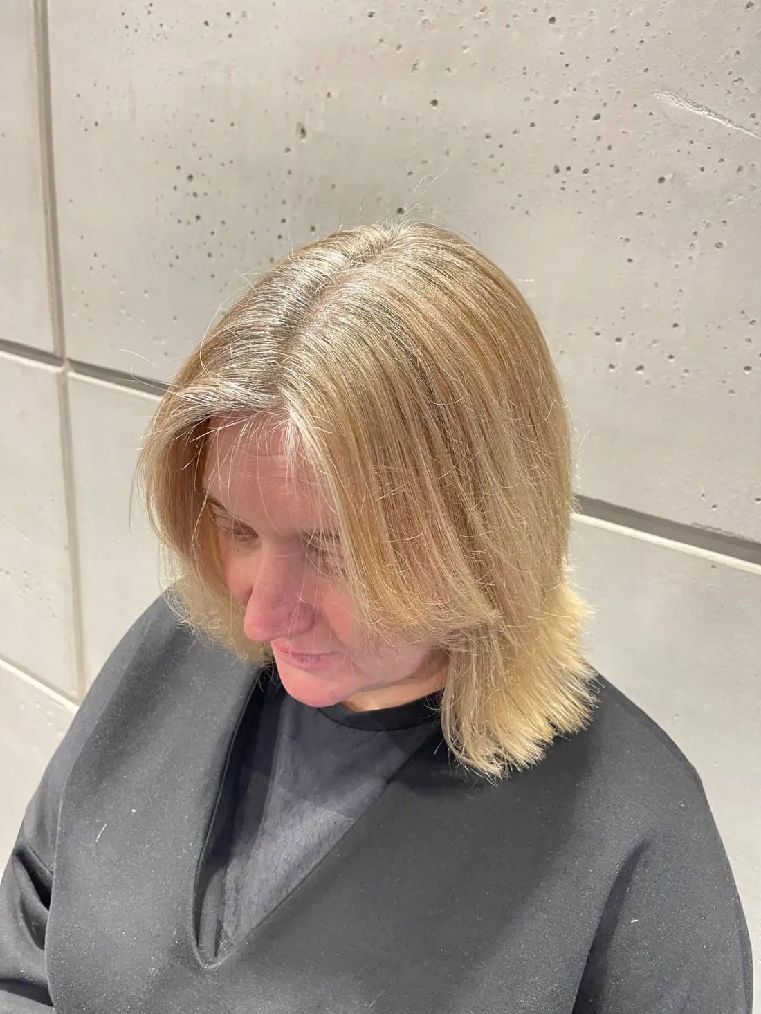 Soft blonde highlight placement by Liza G.